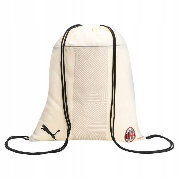 Beige drawstring bag with black strings on a white background