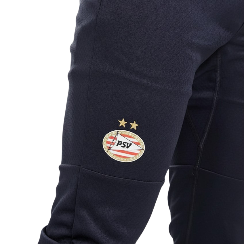 Navy blue pants with a PSV logo on a white background