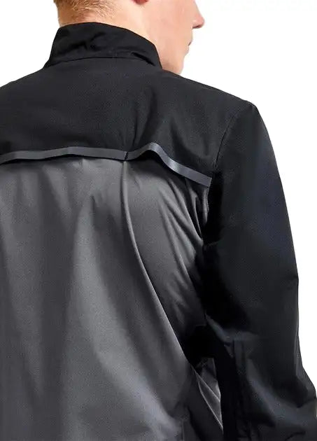 Black and dark gray performance jacket with a sleek, modern design.