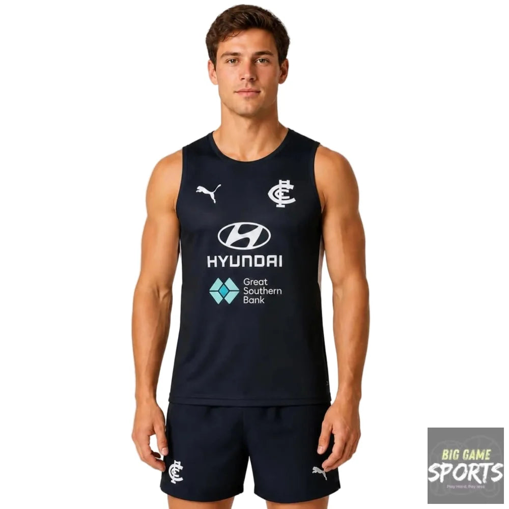 A male model wearing a navy blue sleeveless athletic training top and matching shorts with white and teal sponsor logos, including Puma, Hyundai, and Great Southern Bank, against a light gray background.