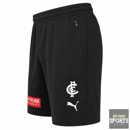 Black athletic shorts with a white Puma logo and a white CFB crest on the left leg, featuring a side zip pocket and a red and white 'Atrobe University' patch on the right hem.