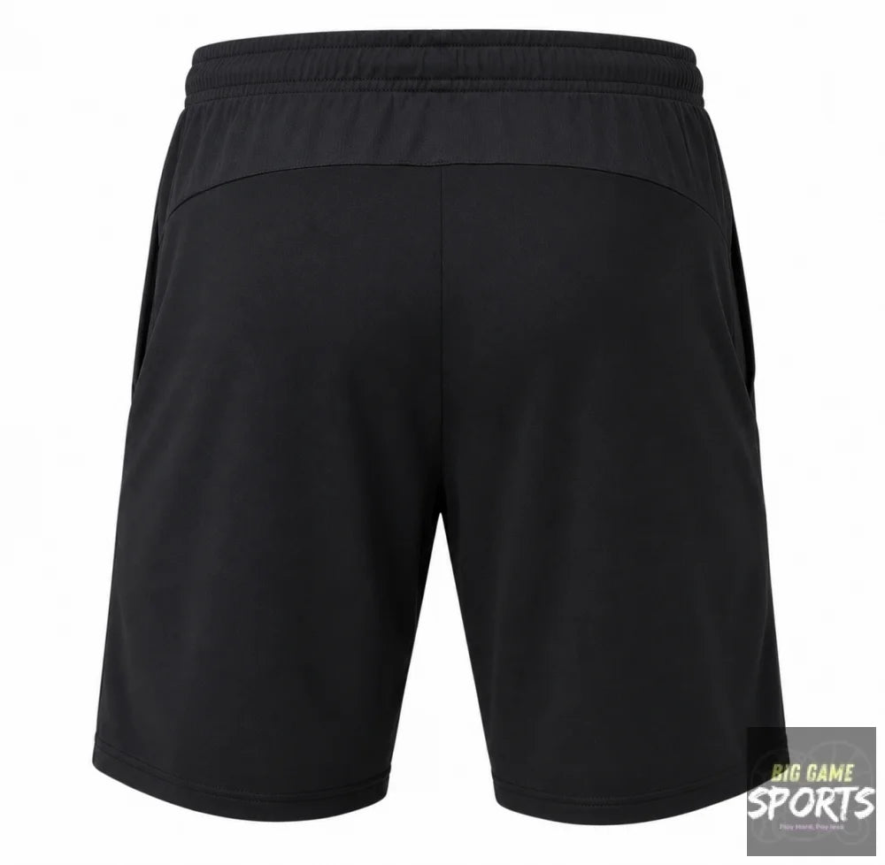 Black athletic shorts shown from the back, featuring an elastic waistband and side pockets, on a solid white background.