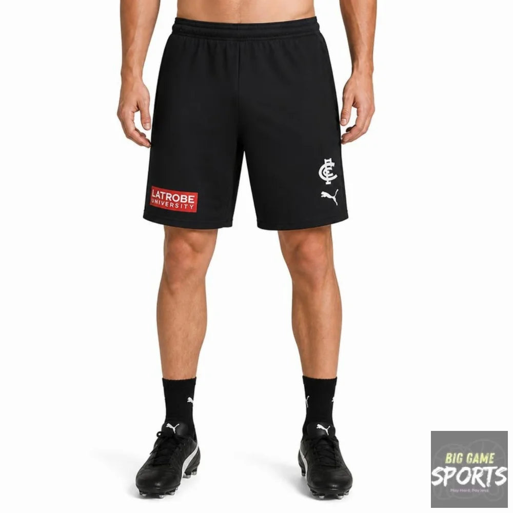 Black Puma athletic shorts with a white club crest on the left leg and a red and white 'LITROBE UNIVERSITY' patch on the right leg, shown on a model against a white background.