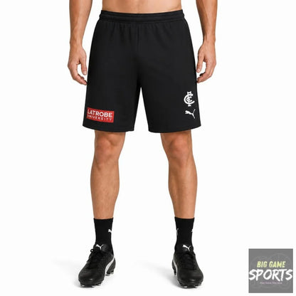 Black Puma athletic shorts with a white club crest on the left leg and a red and white 'LITROBE UNIVERSITY' patch on the right leg, shown on a model against a white background.