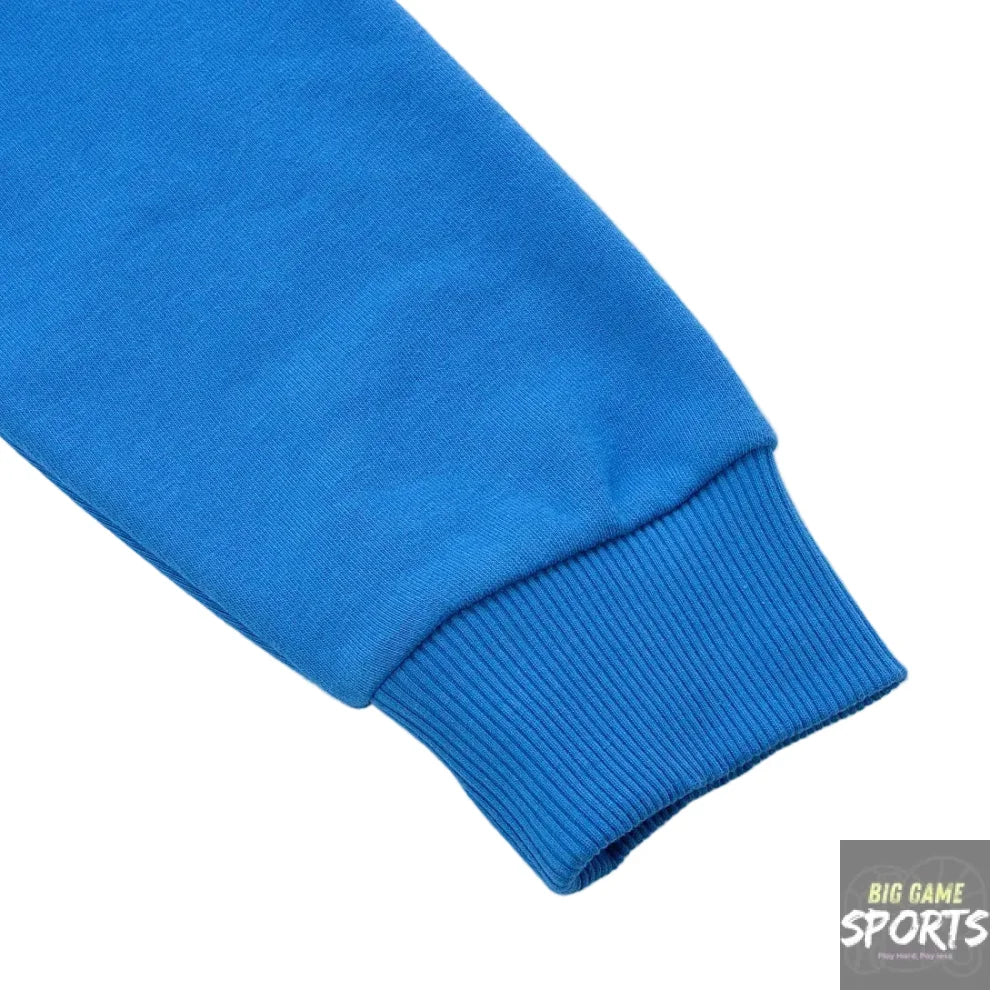 Close-up of a bright blue sweatshirt sleeve with a ribbed elastic cuff on a white background.