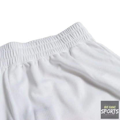 Close-up of white athletic shorts showing the elastic waistband and textured fabric.