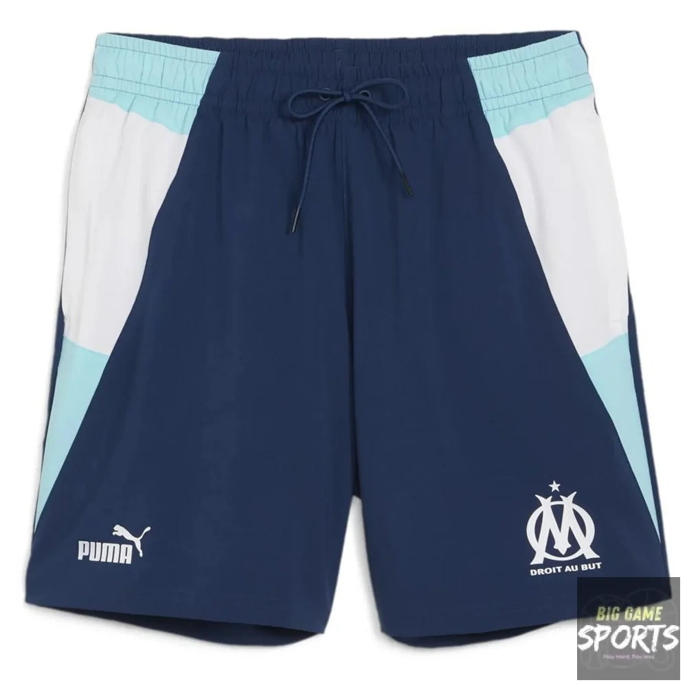 Navy shorts with light blue and white accents featuring Puma and Olympique de Marseille logos on a white background.